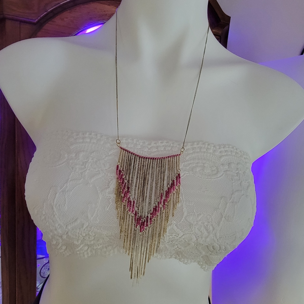 Global and Vine.  Gold necklace With pink beading